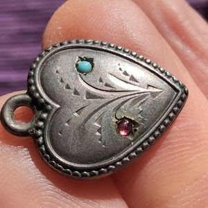 Antique sterling silver puffed heart charm